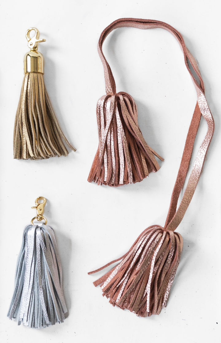 Round Tassel in Gold, Single Pom Pom in Silver, Double Pom Pom in Rosé.