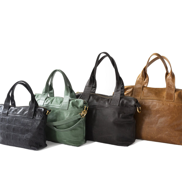 Mini in Black Gator, Small in Rainforest, Medium in Wolf, Office in Sycamore